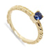 14kt yellow gold engagement ring with blue sapphire and sculpted wheat detail