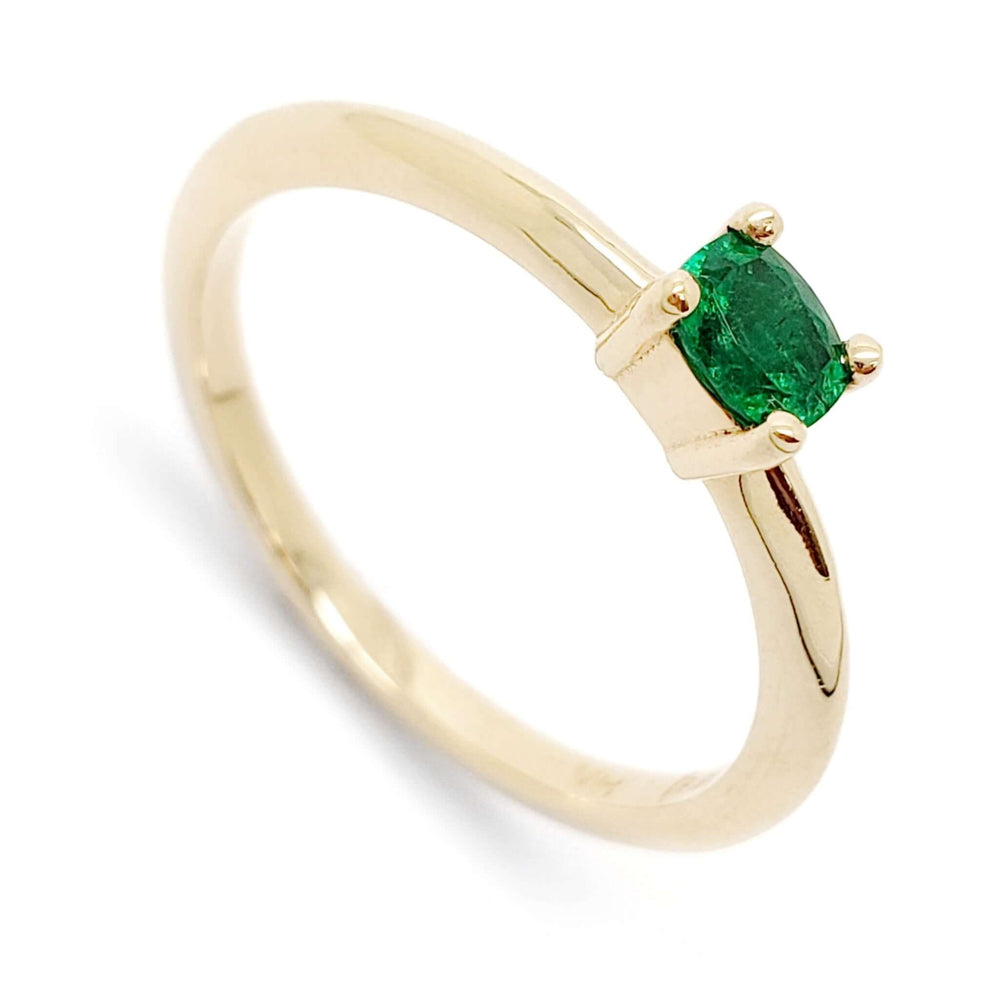 14kt yellow gold engagement ring with an east-west set cushion cut emerald