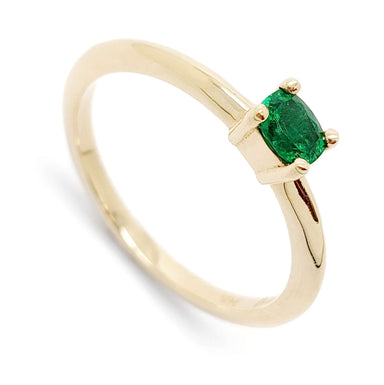 14kt yellow gold engagement ring with an east-west set cushion cut emerald