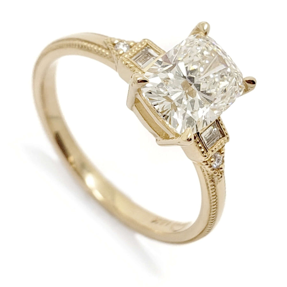 14kt yellow gold engagement ring with elongated cushion cut lab diamond and baguette accents
