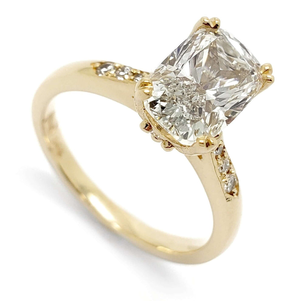 14kt yellow gold engagement ring with elongated cushion cut lab diamond and pave-set diamonds