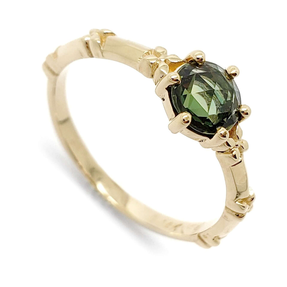 14kt yellow gold engagement ring with rose cut green sapphire and floral details