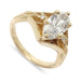 14kt yellow gold engagement ring with marquise-oval lab diamond and side diamonds, angled view