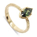 14kt yellow gold engagement ring with marquise cut green sapphire and hand engraving