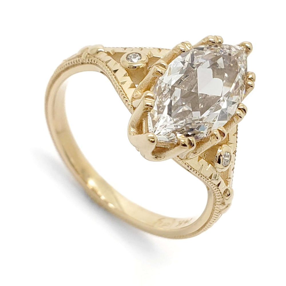 14kt yellow gold engagement ring with marquise rose cut lab diamond and Canadian diamond accents