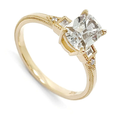 14kt yellow gold engagement ring with old mine cut lab diamond and millgrain detail