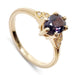 14kt yellow gold engagement ring with oval deep purple sapphire and Canadian diamonds