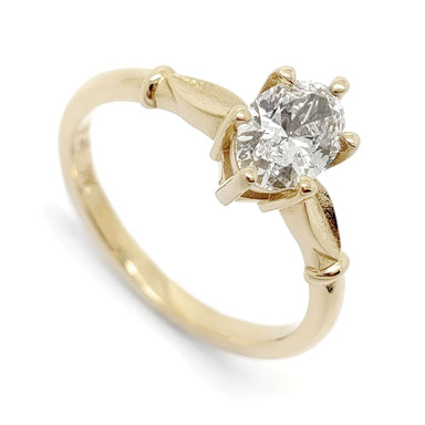 14kt yellow gold engagement ring with oval lab-grown diamond and leaf details