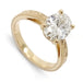14kt yellow gold engagement ring with oval lab diamond and hand engraved band