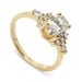 14kt yellow gold engagement ring with oval lab grown diamond and symmetrical cluster setting