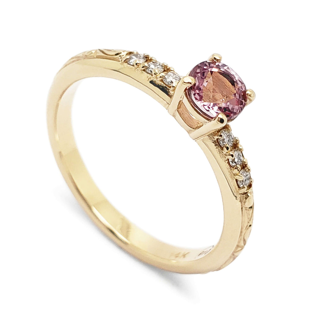 14kt yellow gold engagement ring with pink sapphire and pave Canadian diamonds