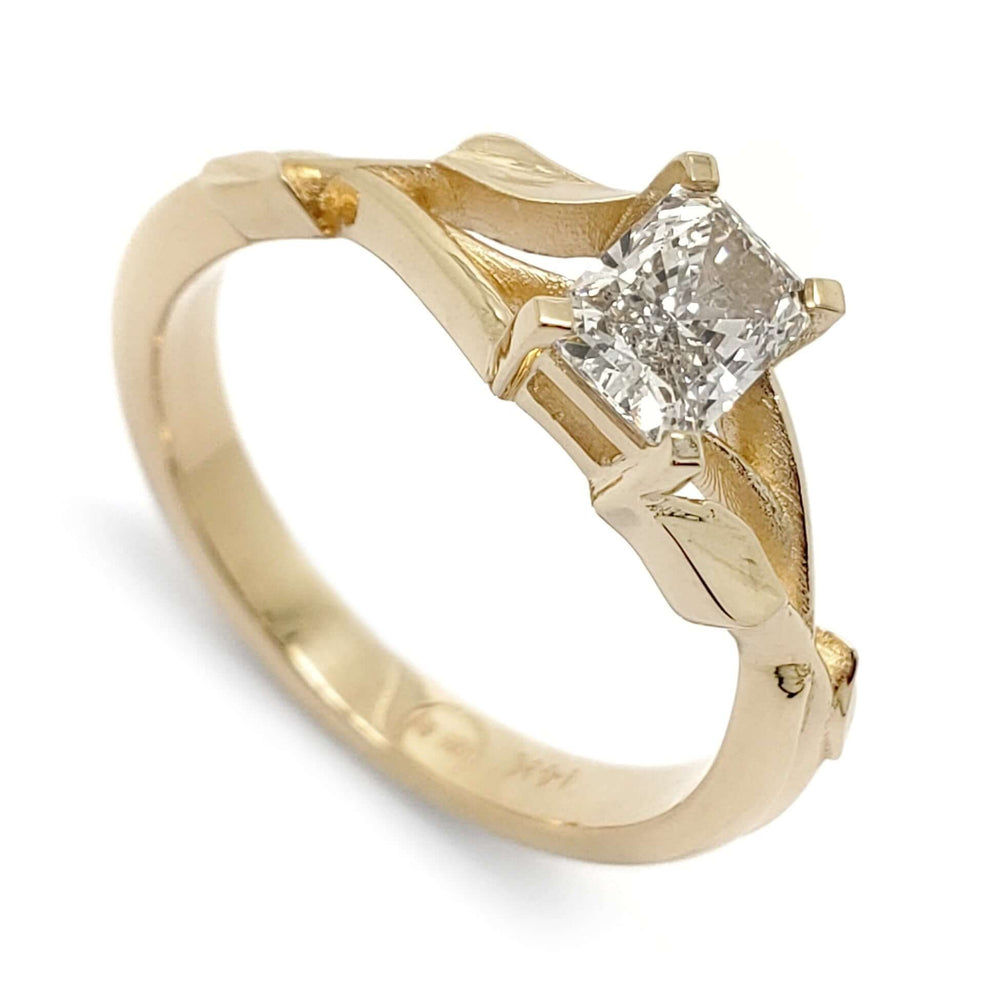 14kt yellow gold engagement ring with radiant cut lab diamond and leaf motif