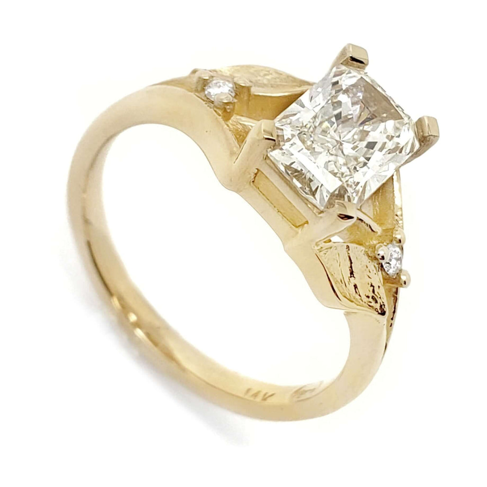 14kt yellow gold engagement ring with radiant lab-grown diamond and leaf details