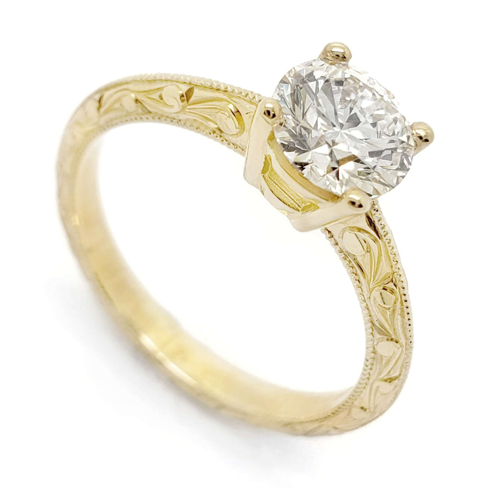 14kt yellow gold engagement ring with round lab diamond and hand-engraved band