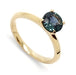 14kt yellow gold engagement ring with round teal Montana sapphire solitaire