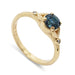 14kt yellow gold engagement ring with teal Montana sapphire and Canadian diamonds
