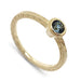 14kt yellow gold engagement ring with teal Montana sapphire and hand engraving