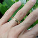 14kt yellow gold engraved wedding ring with Canadian diamonds, worn on hand