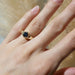 14kt yellow gold hexagon Montana sapphire ring shown on hand