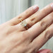 14kt yellow gold lab diamond engagement ring worn on a hand