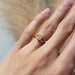 14kt yellow gold lab diamond engagement ring with leaf detail shown on hand