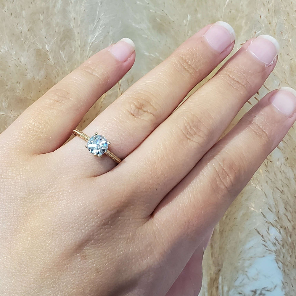 14kt yellow gold lab diamond engagement ring worn on hand