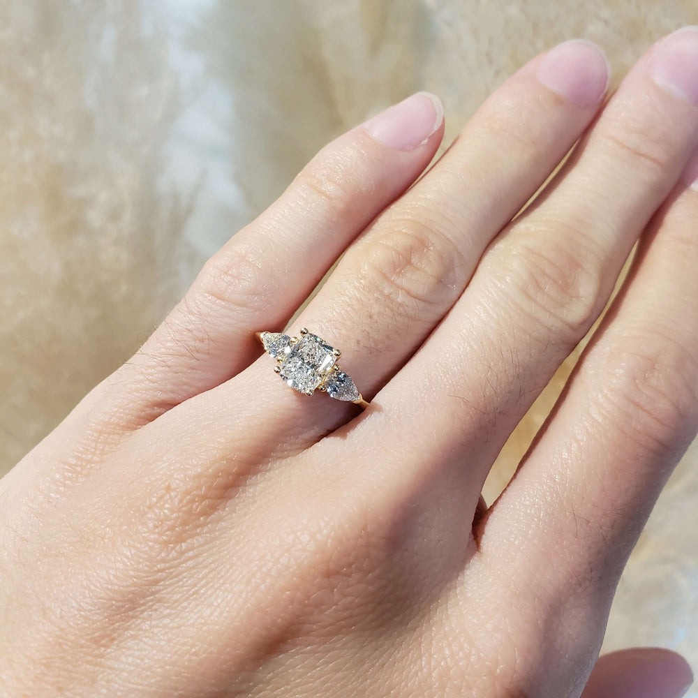 14kt yellow gold lab diamond engagement ring worn on hand