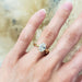 14kt yellow gold lab diamond engraved engagement ring shown on hand