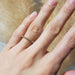 14kt yellow gold lab diamond wedding ring shown on hand