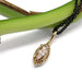 14kt yellow gold marquise champagne diamond pendant displayed on a green stem
