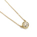 14kt yellow gold necklace with a round rose cut moissanite in a bezel setting