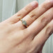14kt yellow gold old European diamond engagement ring shown on hand