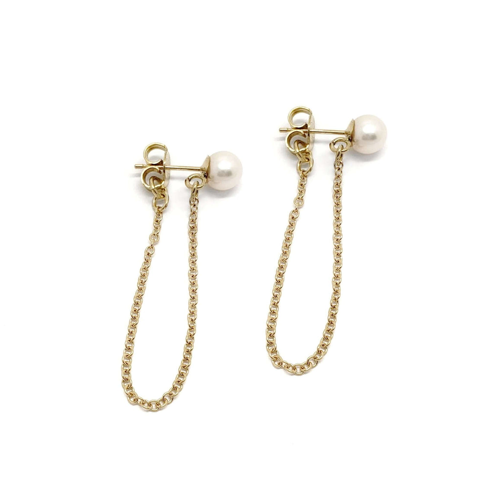 Pair of 14kt yellow gold earrings with round freshwater pearls and delicate chain dangles