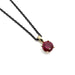 14kt yellow gold pendant with round lab-grown ruby on a black chain