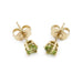 14kt yellow gold peridot stud earrings with butterfly backs