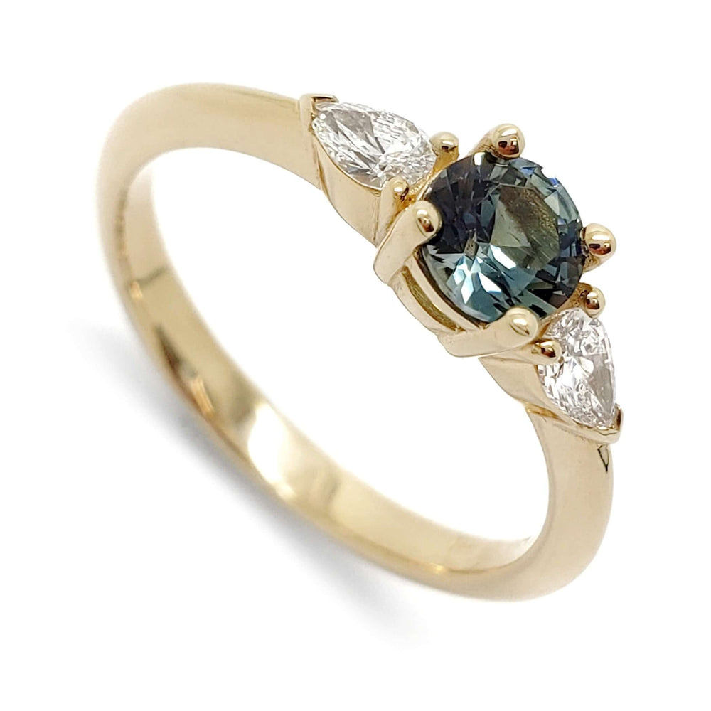 14kt yellow gold ring with round blue-green Australian sapphire and two pear lab diamonds