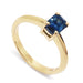 14kt yellow gold ring with emerald cut blue Montana sapphire in claw setting