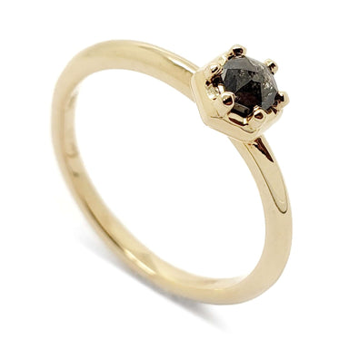 14kt yellow gold ring with a hexagon-set salt and pepper diamond, angled view