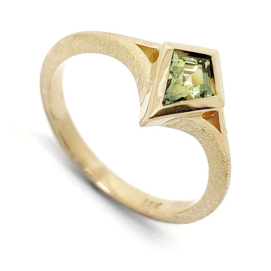 14kt yellow gold ring with kite-shaped green-yellow Australian sapphire in bezel setting
