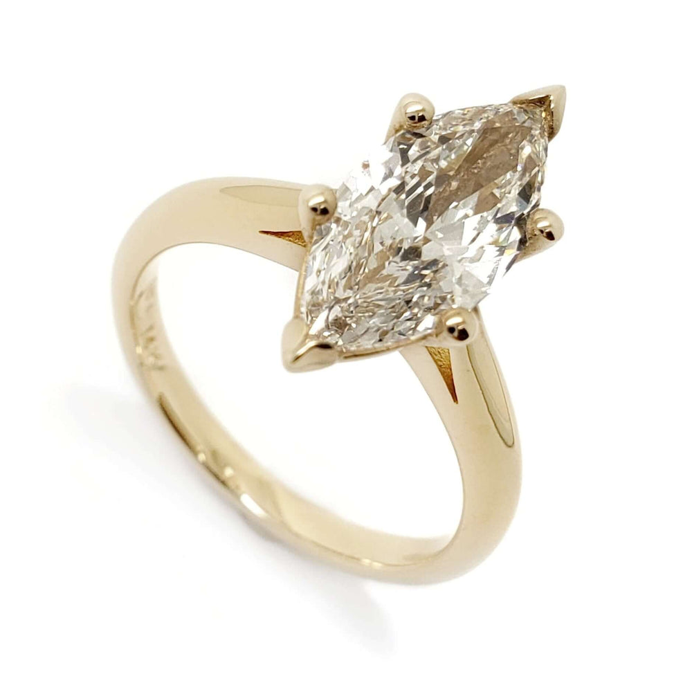 14kt yellow gold ring with marquise cut lab-grown diamond in six-prong setting
