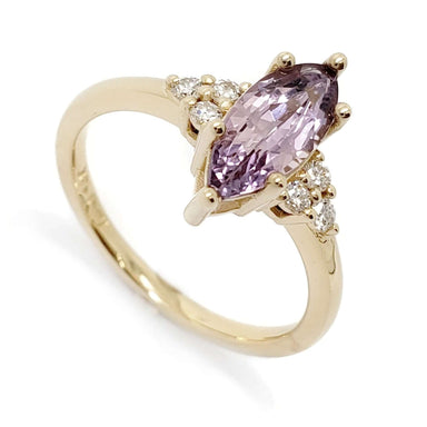 14kt yellow gold ring with marquise purple sapphire and lab diamond accents