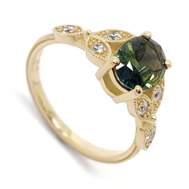 14kt yellow gold ring with oval bi-colour Australian sapphire and Canadian diamond accents