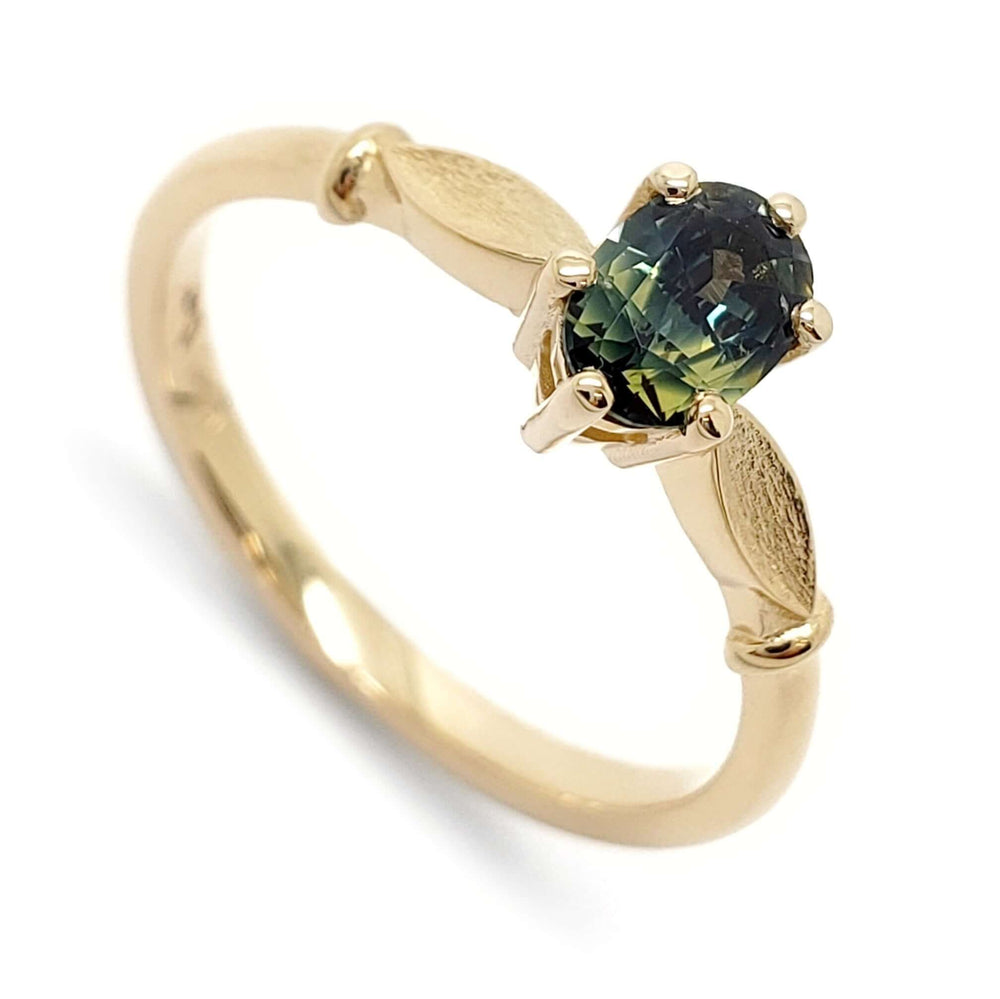14kt yellow gold ring with oval bi-colour blue-green Australian sapphire in six-claw setting