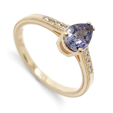 14kt yellow gold ring with pear-shaped lavender sapphire and Canadian diamond accents