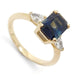 14kt yellow gold ring with radiant cut blue Australian sapphire and two pear lab diamonds