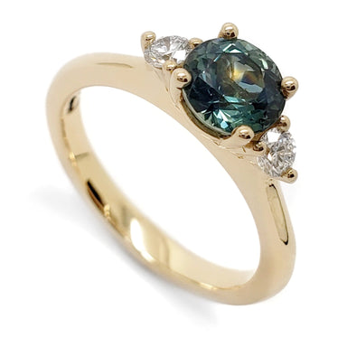 14kt yellow gold ring with round teal Australian sapphire and two lab diamonds