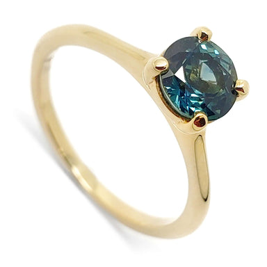 14kt yellow gold ring with round teal Australian sapphire in four-prong setting