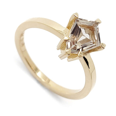 14kt yellow gold ring with shield cut grey sapphire, solitaire setting, close-up view