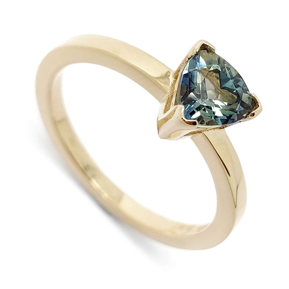 14kt yellow gold ring with trillion cut teal Australian sapphire, close-up view