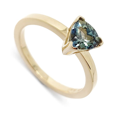 14kt yellow gold ring with trillion cut teal Australian sapphire, close-up view